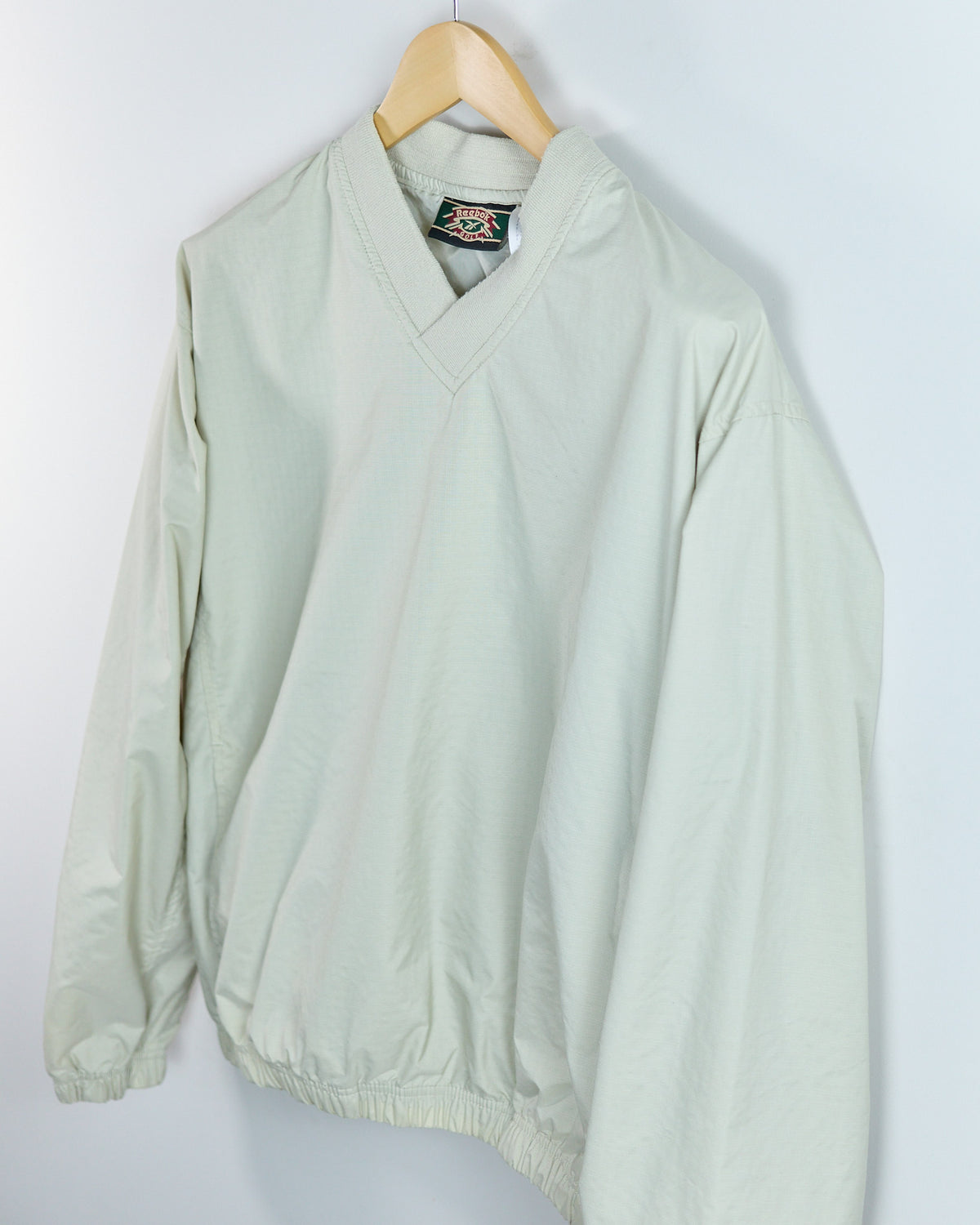 Early 90s Reebok Cream V Neck Windbreaker (M)