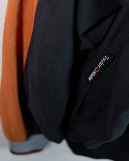 90s TaylorMade Black/Orange V Neck Windbreaker (M)