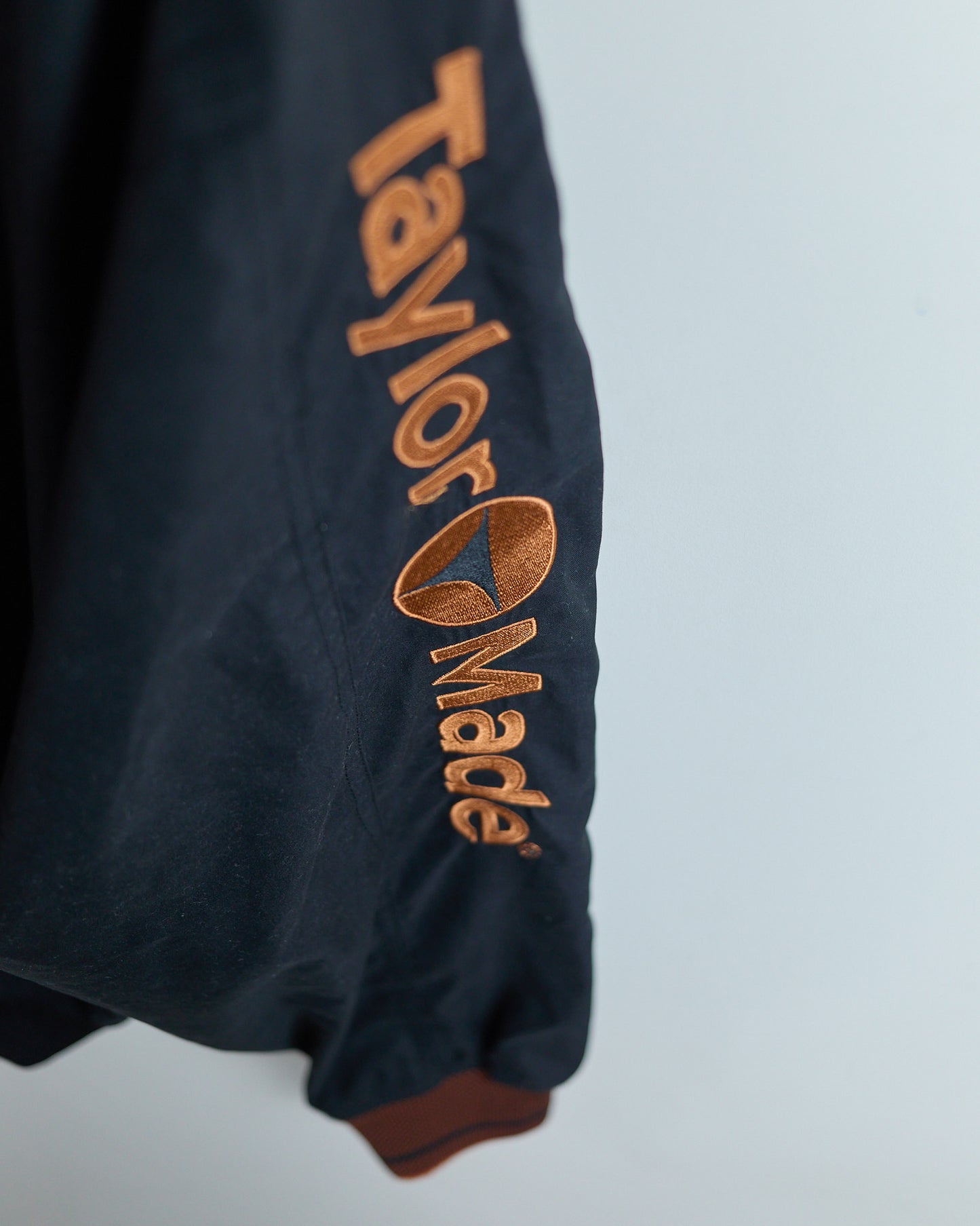 90s TaylorMade Black/Orange V Neck Windbreaker (M)